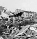 USA: The 1900 Galveston Hurricane. 'Seeking valuables in the wreckage', 1900